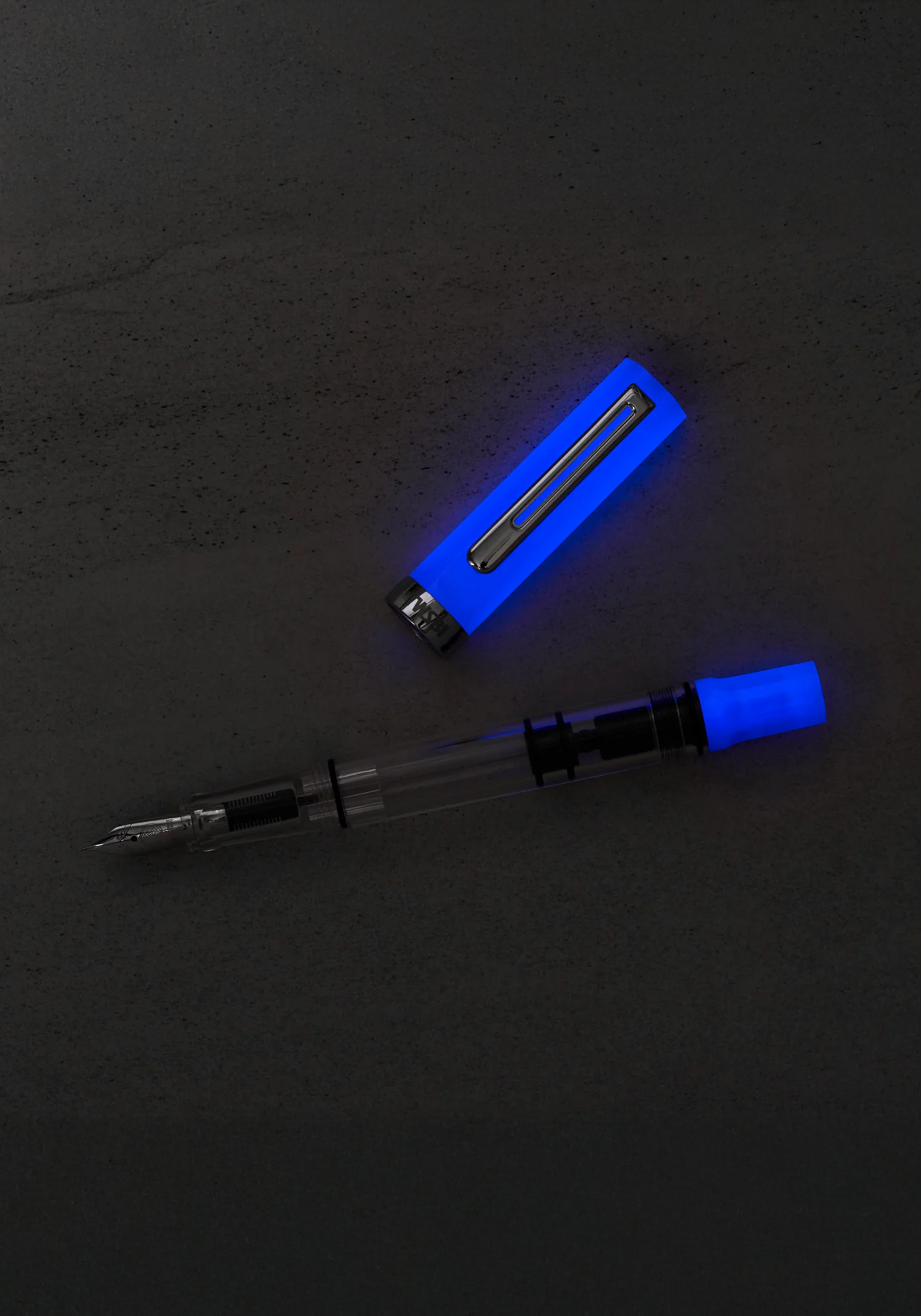 עט נובע סגול ושקוף | TWSBI ECO Glow Purple